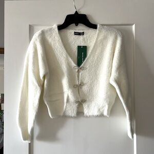 SHEIN white sweater with bows